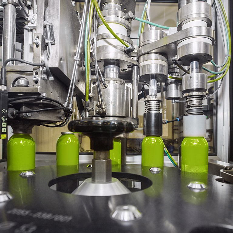 Bottling line for aerosols with green cans